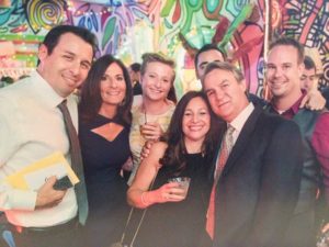 Matthew (far right) surrounded by his family and friends
